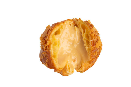 Caramel cream puff cut open – PNG, front view, isolated on transparent background