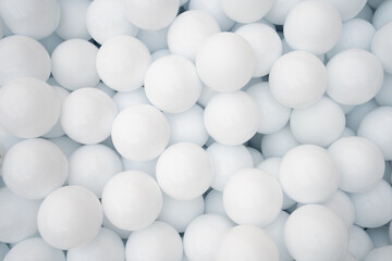 Many white plastic balls for dry pool in amusement park
