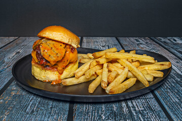 the hamburger has evolved from a simple piece of ground beef to a complex cultural and culinary icon