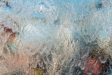 Aqua background. Product space next to clean water streams and water splashes and drops.