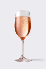 Elegant glass of sparkling rose wine with fine bubbles rising, on a white background