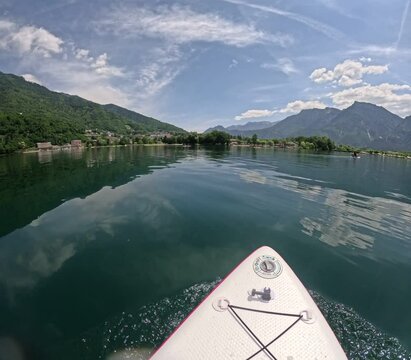 Lake of Levico in Trentino, northern Italy, seen during a hike on a stand up paddle board on a beautiful day in June