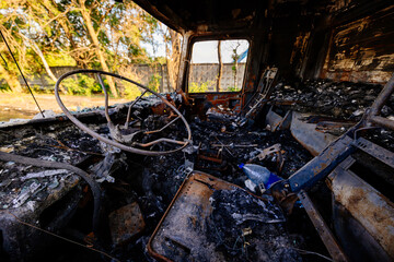Inside of burnt truck. Fire or attack aftermath