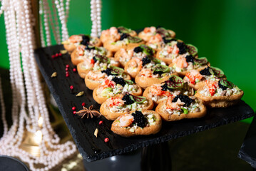 Gourmet Seafood Canapés with Caviar Topping.