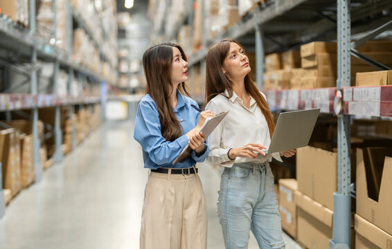 Female engineers team discussing inventory in warehouse logistics and supply chain planning, operation management, data analysis, warehouse shipping, inventory tracking, optimization and technology - Powered by Adobe