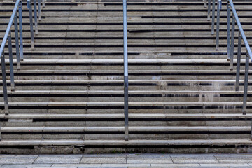 The stairs are empty and the steps are made of stone