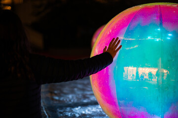 hand touch connect colourful ball sphere night dark vivid