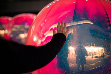 hand touch connect colourful ball sphere night dark vivid