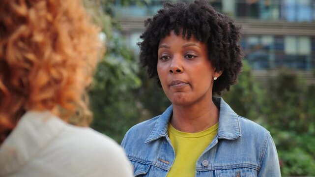 A heated discussion unfolds as two women express their emotions, showcasing anger, frustration, and the complexities of conflict resolution in interpersonal relationships.