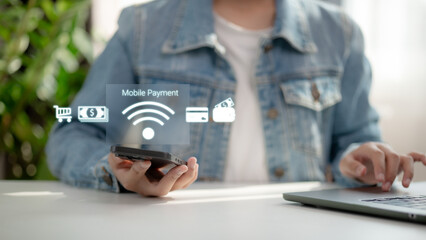 A person using a smartphone for mobile payment with digital icons. Concept of contactless transaction, online shopping, digital wallet, fintech, and cashless economy.