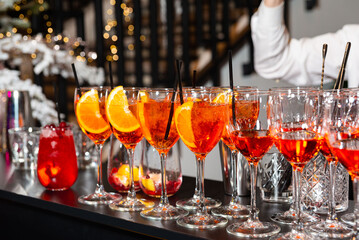 Glasses of Orange Cocktails at Festive Event.