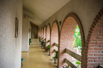 A view of a passage in an old-style architectural house.
