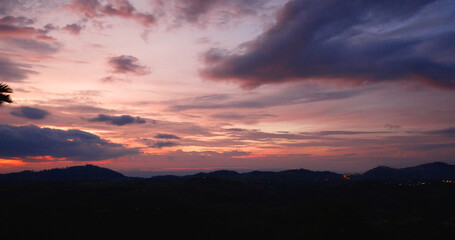 Golden sky sunrise dramatic beautiful landscape view. Dawn sky gold dusk time cloudscape with...