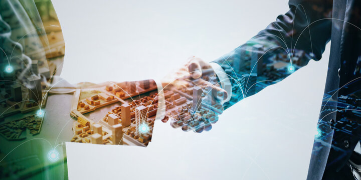 握手するビジネスパーソンのグループとデジタルネットワークのコンセプト　バナー・広告向け横長ビジュアル - Powered by Adobe