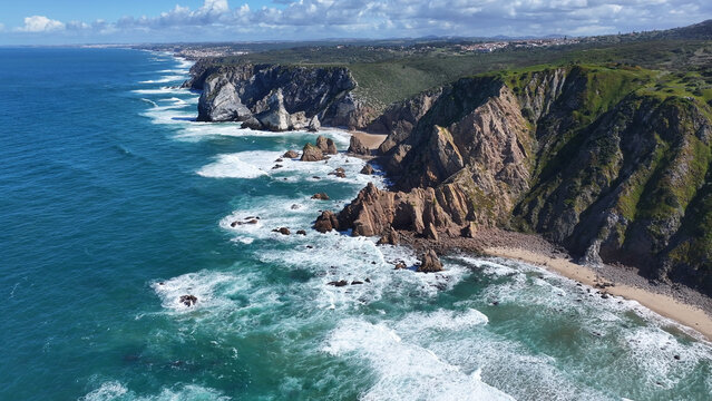 Roca Cape Cliffs At Sintra In Lisbon District Portugal. Beach Landscape. Nature Seascape. Travel Destination. Roca Cape Cliffs At Sintra In Lisbon District Portugal. Turquoise Water.