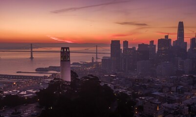 Aerial view of San Francisco, USA, at sunrise. Coit Tower stands prominently on Telegraph Hill,...