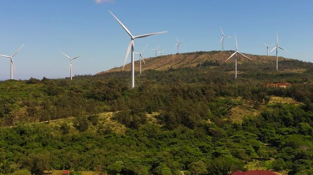 Wind generators turbines and wind farm mills. Wind power plant. Philippines.