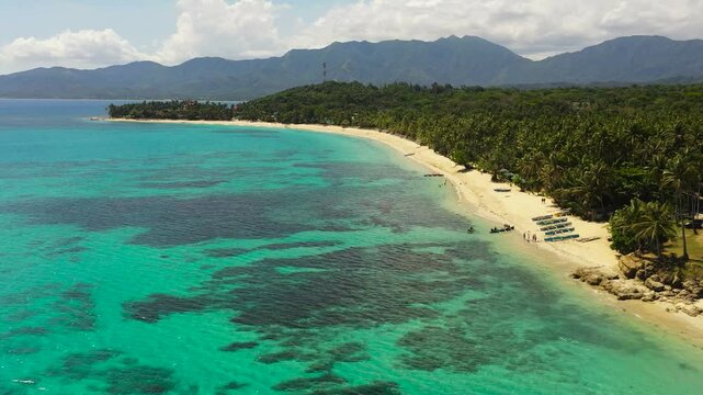 Top view of tropical beach and blue sea. Pagudpud, Ilocos Norte, Philippines.