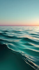 Obraz premium Serene Ocean Scene with Gentle Waves Calm Sea Sunset Sky and Clear Water Tropical Environment Relaxation Background