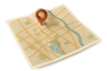 Location pin indicating precise urban destination, resting on folded street map against transparent backdrop, representing travel navigation strategy