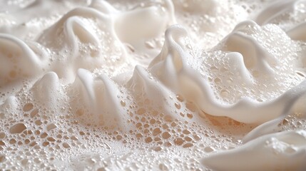 Close-up View of Bubbly Foam Waves Creating an Abstract Texture