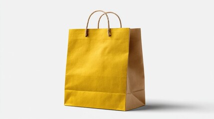 A vibrant yellow paper shopping bag stands alone on a clean white background, showcasing simplicity