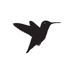 Silhouette of hummingbird hovering mid-air with upward fluttering wings and long beak facing forward