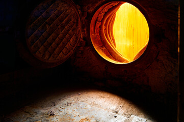 Interior view of operating steam boiler furnace showing intense flame combustion at a thermal power...