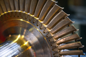 Rotor detail with thin blades crown on shaft in car workshop