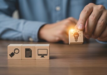Design Thinking Process concept. problem-solving methodology used for innovation and strategic development. Wooden blocks with icons; the key stages of the design thinking process, a solution-focused