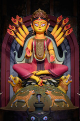Idol of Goddess Devi Durga in a beautifully decorated pandal during the Durga Puja festival of Hinduism in West Bengal, India