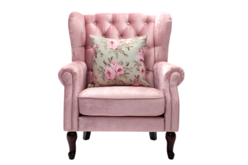 Elegant pink armchair with floral cushion. Perfect for interior design and home decor.