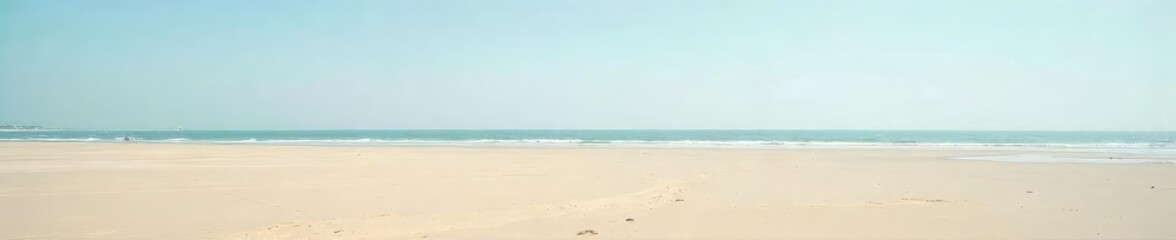 Fototapeta premium Vast expanse of empty beach at low tide, revealing smooth sand and subtle textures under a clear sky Perfect for serenity, nature, travel, and minimalist themes , holiday, shoreline