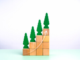 Green business and environmental, agriculture concept. Rise arrow on tree growth, eco wooden toys...