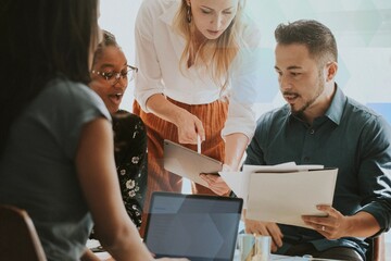 Business people working with a digital tablet in a meeting