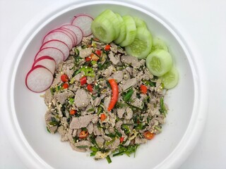 Larb Moo, a delicious local dish from the northeastern region of Thailand. Aroma from essential...