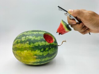 Ideas for arranging a watermelon plate to look unusual by adding a wine bottle opener to decorate...