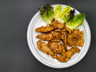 Fusion food with Tandoori chicken menu that combines Indian, Chinese and Thai spices with aromatic...