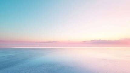A serene, pastel-colored sky with a calm, reflective sea in the foreground, evoking a sense of tranquility and peace.