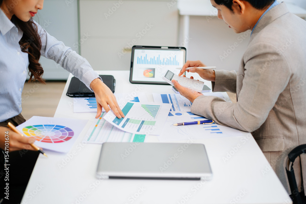Poster business documents on office table with smart phone and calculator digital tablet and graph business