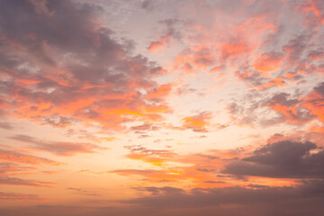 Dramatic sky and beautiful sunset over the tranquil beach