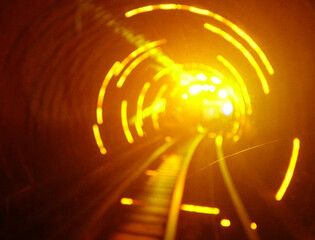 Abstract motion blur of circular fire light of The Bund Sightseeing Tunnel, Shanghai.