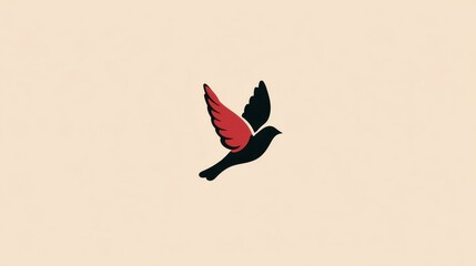Fototapeta premium Freedom and Hope: A stylized black bird with one red wing soars gracefully, symbolizing freedom, hope, and the beauty of flight, with a touch of artistic flair.