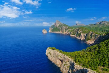 Explore the breathtaking coastal beauty of Mallorica, Spain, with its majestic cliffs and crystal-clear waters. A perfect destination for nature lovers and adventure seekers.