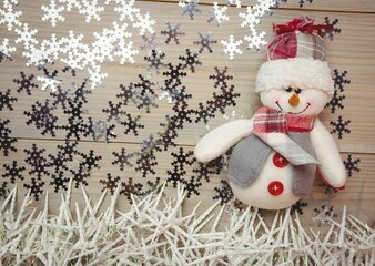 High angle view of snowman by snowflakes