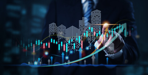 Businessman analyzing real estate investment data with futuristic city skyline and candlestick chart, property growth, market trends, and financial analytics.