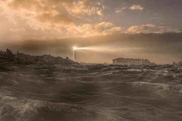 Stormy sea with lighthouse