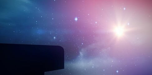 Building against multi colored glowing sky