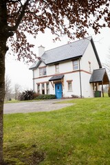 Grassy field outside house