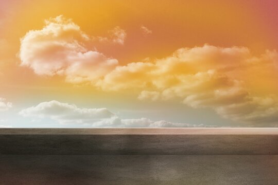 Fototapeta Flat design scene is showing grey paved surface meeting reflective horizon under warm tinted clouds